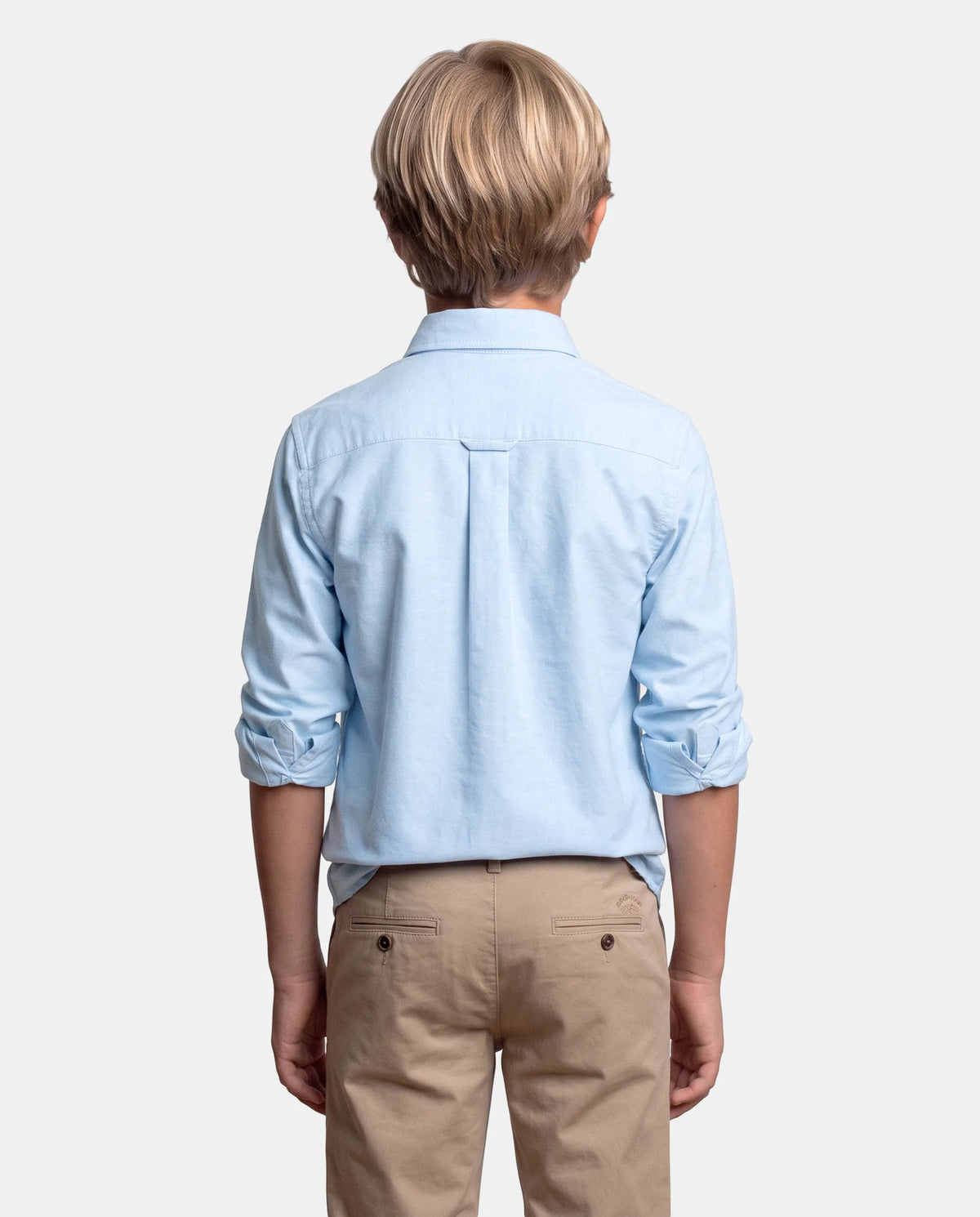 CAMISA CUELLO BOTON OXFORD LISO NIÑO CELESTE