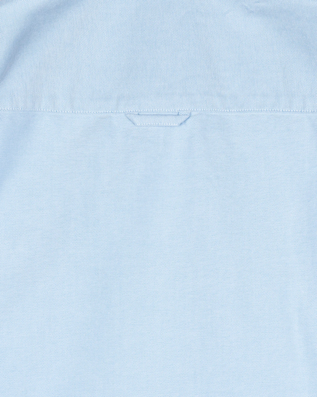 CAMISA CUELLO BOTON OXFORD LISO NIÑO CELESTE